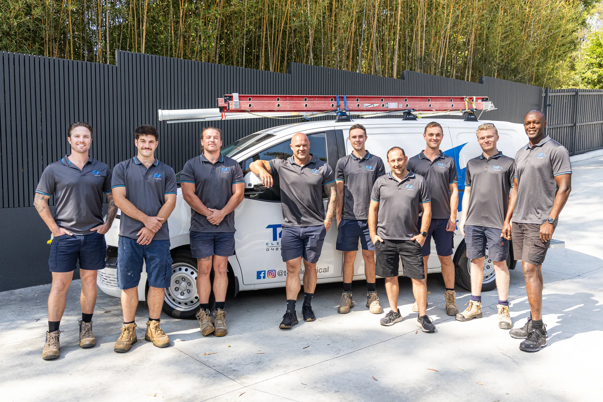 The Air Conditioning Labrador team with a service van
